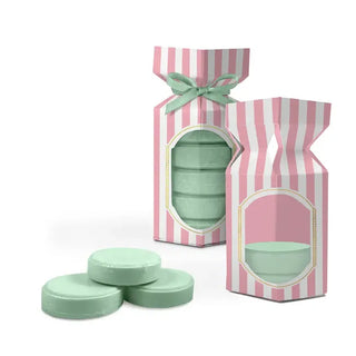 Sweetheart Pink striped shower steamers packaging with mint green disc tablets by Studio Oh