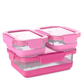 Stacked arrangement of four pink glass food storage containers with clear bodies