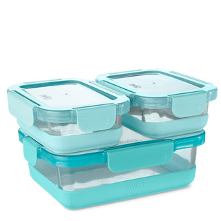 Swig three-piece aqua teal glass food storage containers with locking lids stacked together
