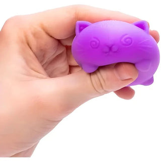 deep purple NeeDoh cat being squeezed to demonstrate rebound elasticity