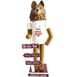 12-inch Texas A&M mascot nutcracker with maroon and white Aggie dog design, resin construction, and directional signs