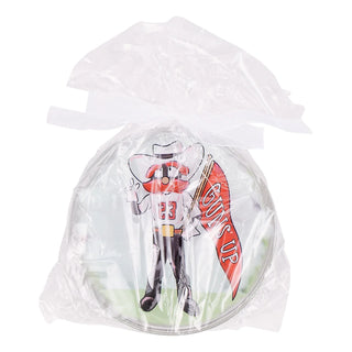 Toy figure with a surfboard in a clear plastic bag 
