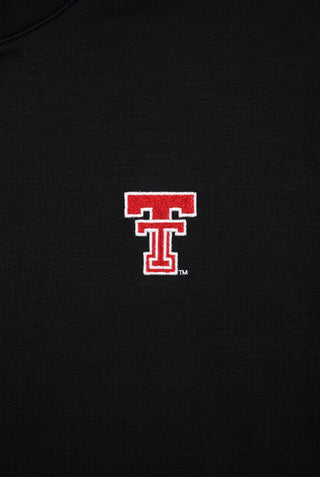 Black quarter-zip top with embroidered red Texas Tech double-T logo on chest