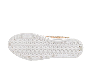 Bottom sole view of white Corky sneaker with geometric waffle tread pattern
