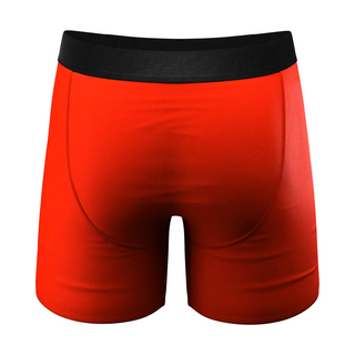 Back view of Shinesty Ball Hammock boxer briefs in hot dog red-orange with black waistband