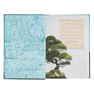 Interior spread of The Discovery Bible showing illustrated endpapers and gift dedication page with tree artwork