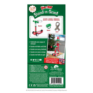 Back of Elf on the Shelf Stand-n-Scoot packaging showing included scooter, helmet, and scarf accessories
