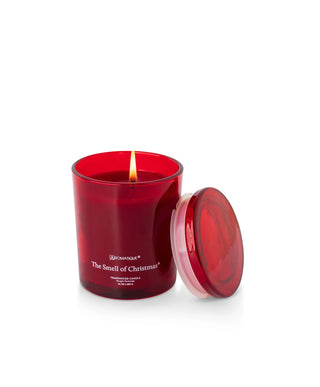 Aromatique The Smell of Christmas red glass candle lit with red lid, 10oz