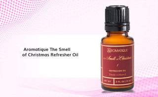 Aromatique The Smell of Christmas Refresher Oil in 0.5 fl oz amber glass bottle with burgundy label