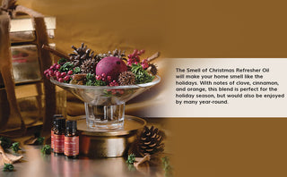 Aromatique Smell of Christmas Refresher Oil bottles displayed with festive holiday potpourri arrangement