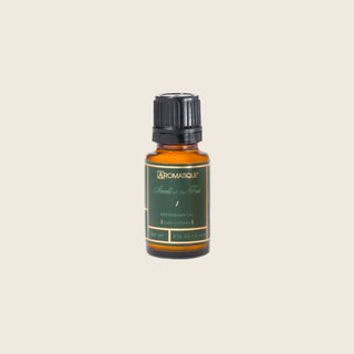 Aromatique Smell of the Tree Refresher Oil in 0.5 fl oz amber glass bottle with green label