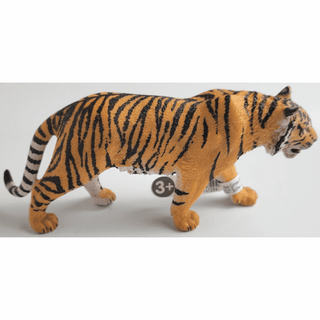 Schleich orange tiger toy figurine side profile with black stripes and white underbelly