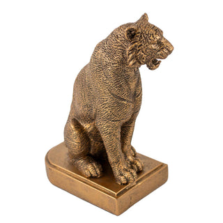 Gold-toned resin tiger figurine seated on rectangular base, detailed textured finish