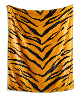 Orange and black tiger stripe fleece throw blanket hanging flat