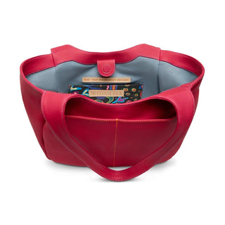 Red handbag with a visible brand label 