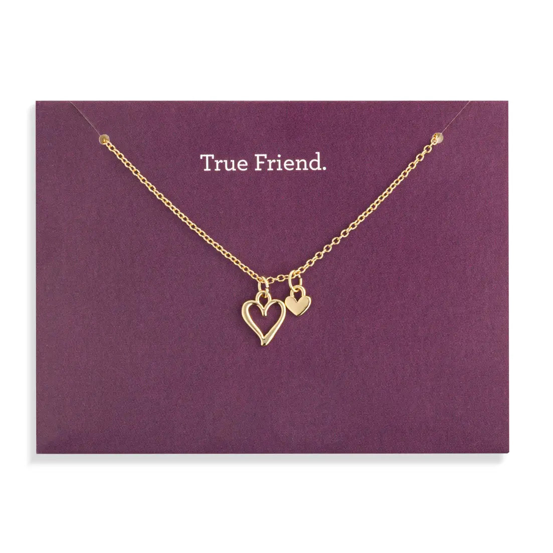 Gold necklace with heart charms on a purple card with 'True Friend' text