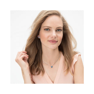 Woman wearing Brighton Twinkle Mini Post Earrings with matching necklace in blue