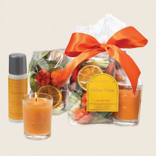 Aromatique Valencia Orange Gift Set Trio with votive candle, aerosol spray, and decorative potpourri bag