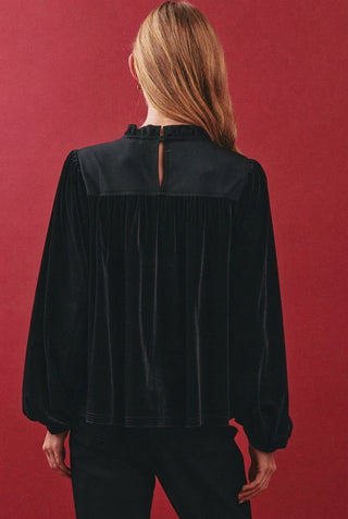 Oddi black velvet blouse with ruffle neckline, balloon sleeves, and keyhole back