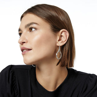 Model wearing Brighton Venezia Teardrop French Wire Earrings in silver on ear profile view
