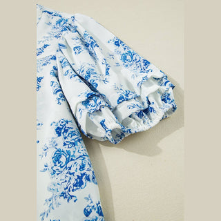 Detailed shot of Viola blouse tiered puff sleeve elasticated ruched cuff construction