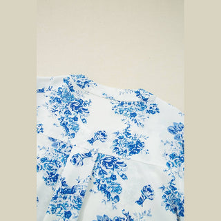 Close-up of Viola blouse back yoke seam and upper back floral print density