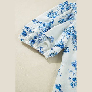 Macro close-up of Viola blouse sleeve cuff highlighting gathered tiered ruffle design