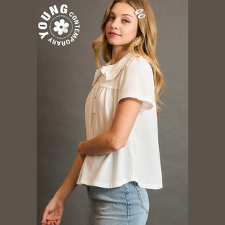 Woman wearing a white blouse