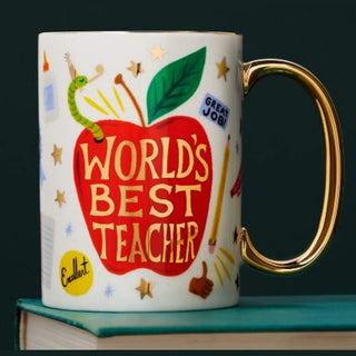 Mug with 'World's Best Teacher' text and apple design