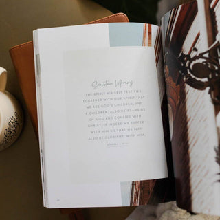 Worthy Bible Study book open to Romans 8:16-17 Scripture Memory page