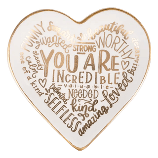 heart shaped tray with gold letters spelling out words of affirmation