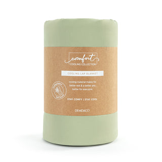 Demdaco Comfort Cooling Collection lap blanket rolled and packaged in sage green with kraft paper band