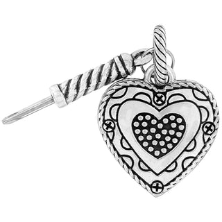 Brighton silver heart-shaped charm with ornate details and twisted rope handle