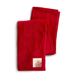 Folded red fleece throw blanket with cardinal patch label, 50x60 inches