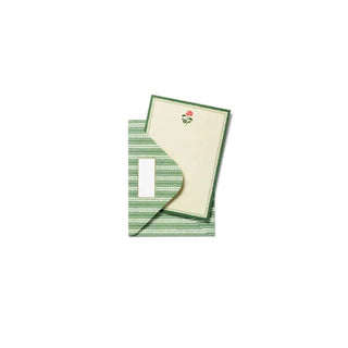 Notebook with green striped cover and white interior 