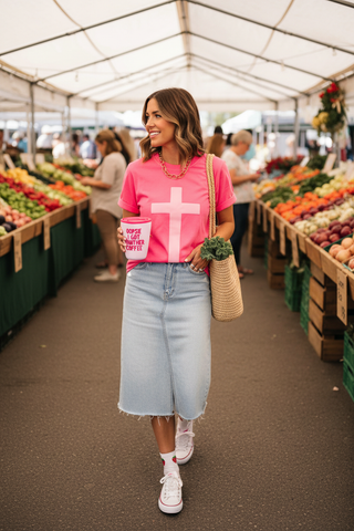 Pink Cross Puff Tee tucked into midi skirt with sneakers at farmers market