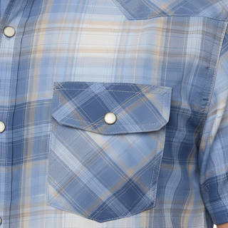 Detail of blue plaid fabric and snap buttons