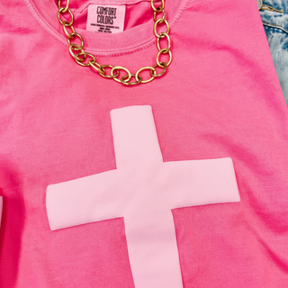 Pink Cross Puff Tee close-up showing cross graphic design on front