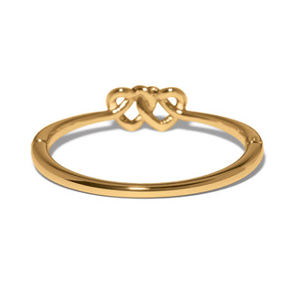 Brighton gold hinged bangle bracelet featuring interlocked double heart motif centerpiece