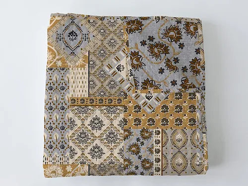 laramie patchwork in gold quilt