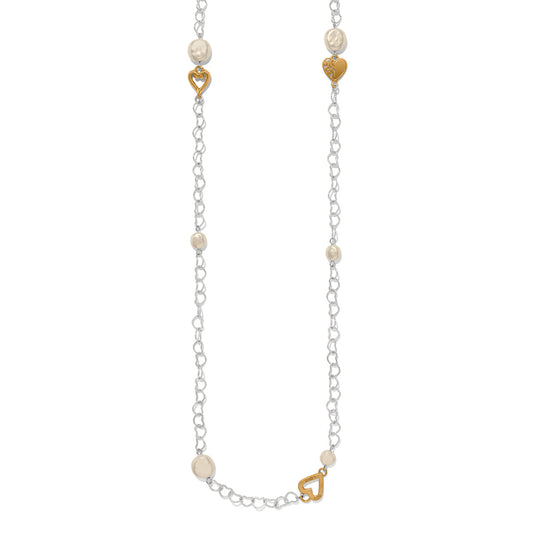 Necklace with heart-shaped gold charms and pearl beads on a silver chain
