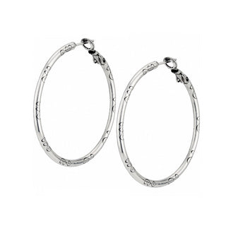 Brighton silver hoop earrings with decorative heart pattern engraving on white background