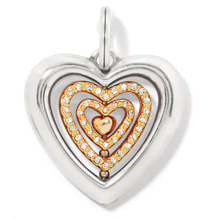 Brighton Heartbeat Amulet pendant with silver exterior and gold crystal-studded heart design