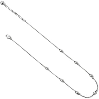 Brighton silver-tone chain necklace with seven bezel-set crystal stations and lobster clasp
