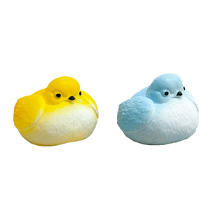 Two chubby bird squishies in yellow and blue with white bellies