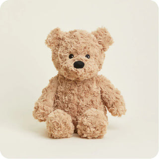 Brown curly-fur teddy bear Warmies plush toy with tan-beige synthetic fur texture and black button eyes