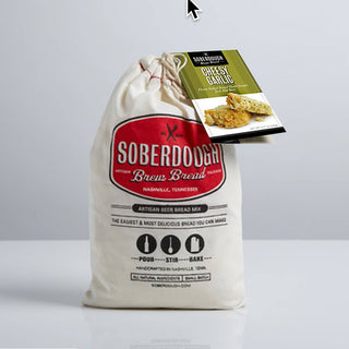 Cream Soberdough Brew Bread mix bag with Cheesy Garlic flavor tag, artisan beer bread mix pour stir bake
