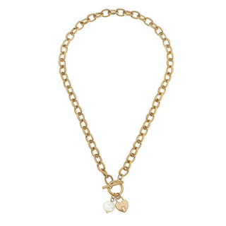 Worn gold T-bar necklace with heart lock charm and pearl bead, 16 inch chain