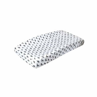 Gray dinosaur silhouette print diaper changing pad cover on white stretch knit