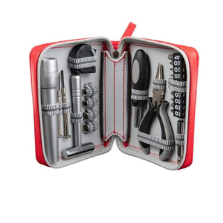 Open red vegan leather repair kit displaying organized 22-piece tools and dual-compartment layout